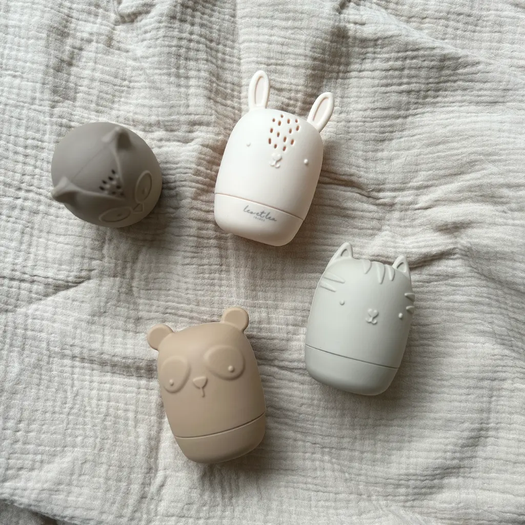 Jouet de bain beige en silicone pour bébé, 4 animaux 1 - Léo et Léa.webp